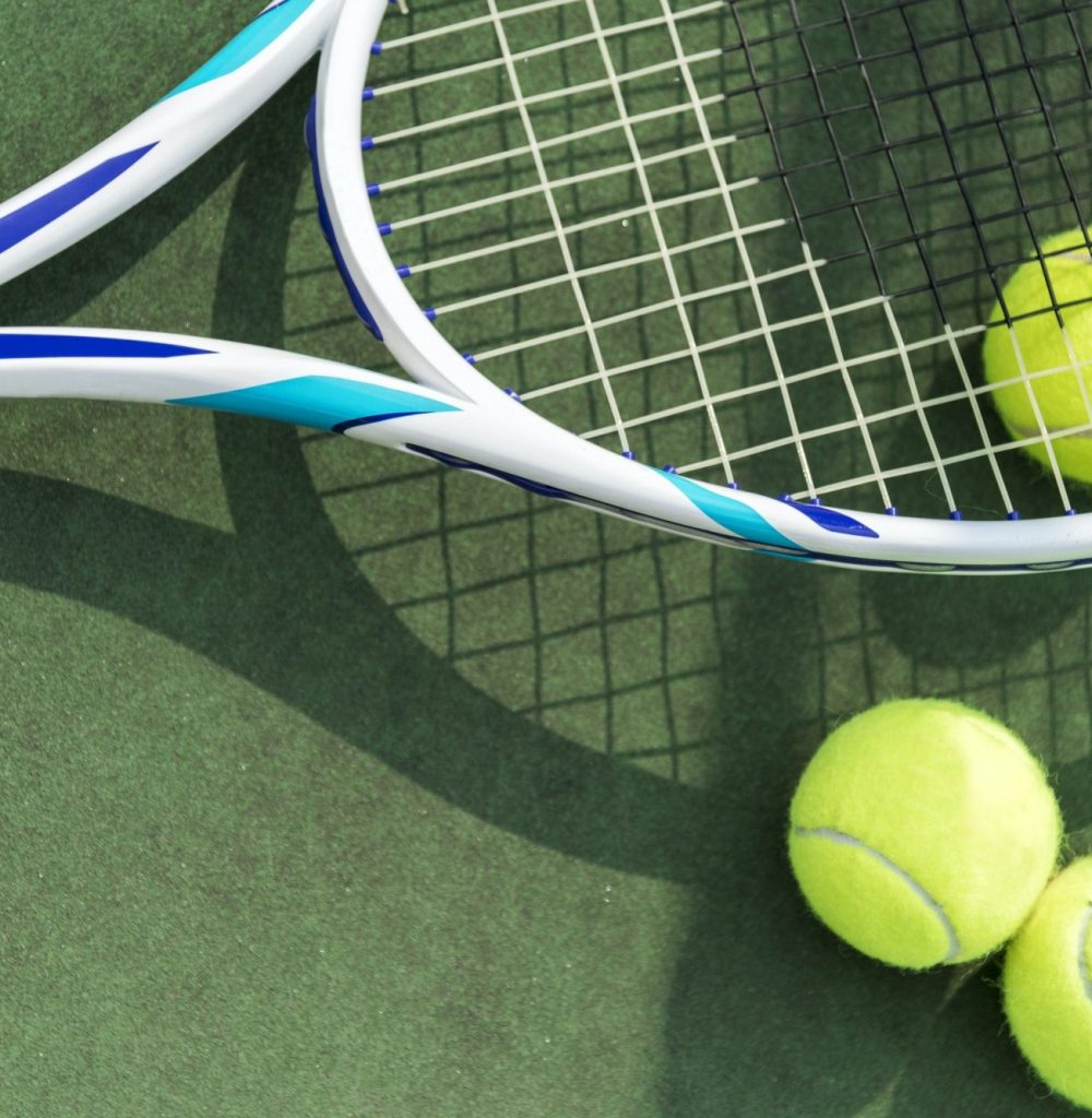tennis-balls-on-a-tennis-court-1.jpg